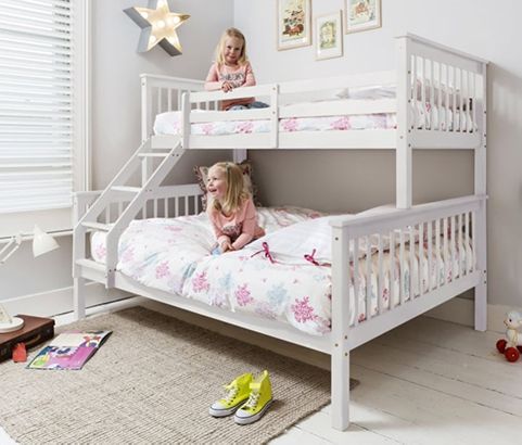 bunk beds with double bed at bottom